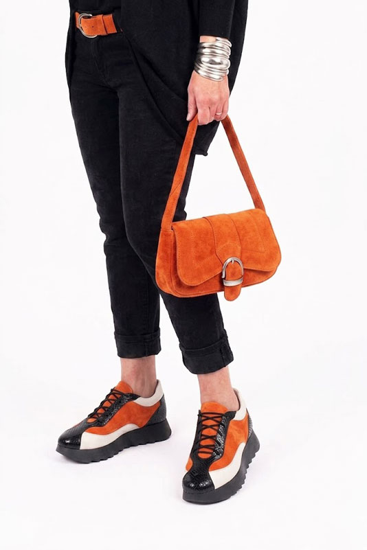 Dress sneakers in satin black, clementine orange and off white leather with thick rubber soles and round toe - Worn view